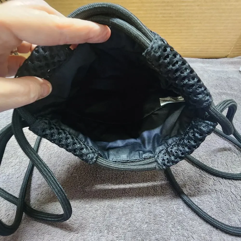 Black Nike slingbag small vinyl mesh backpack p1